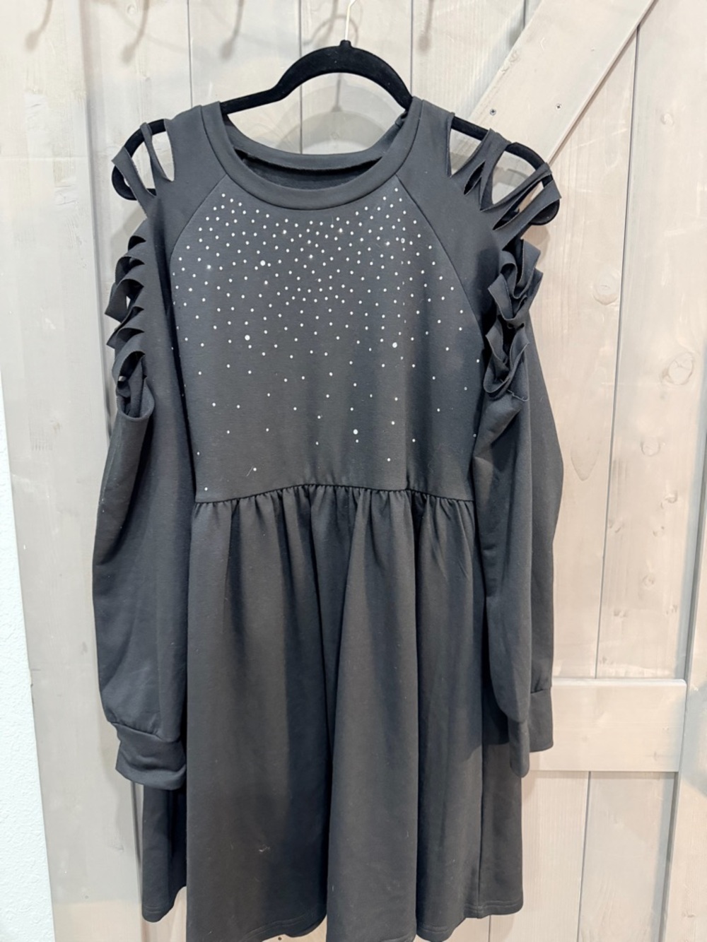 Woman ' Black Cold-Shoulder Dress with Rhinestone Detail- long sleeve in a large